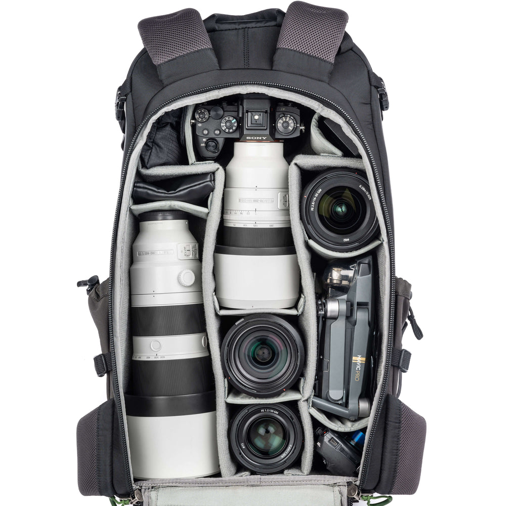 Holds 2 standard-size camera bodies and 4-6 standard zoom lenses plus a flash