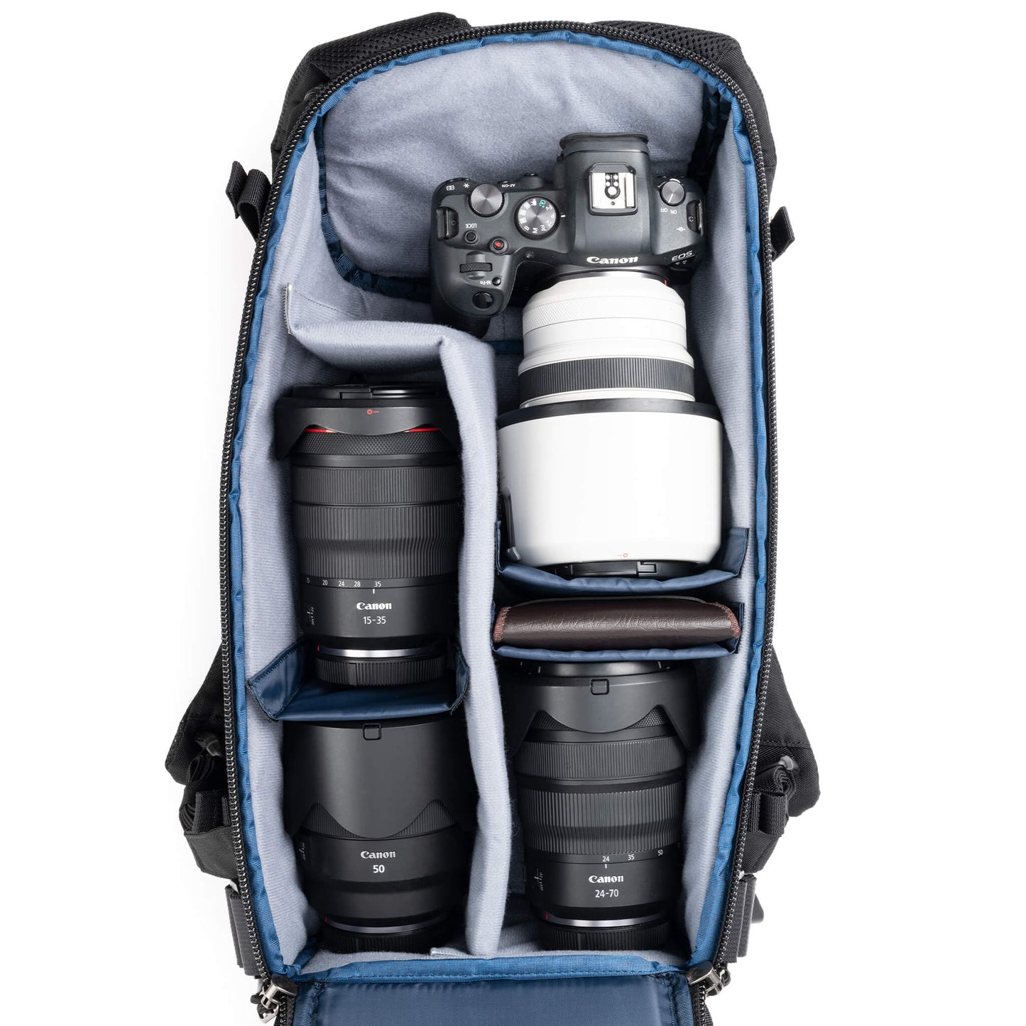 
                  
                    Holds a standard-sized camera body with lenses attached and 1–3 standard zoom lenses
                  
                