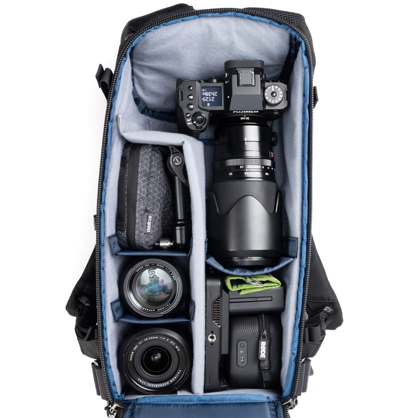 
                  
                    Holds a standard-sized camera body with lenses attached and 1–3
standard zoom lenses
                  
                