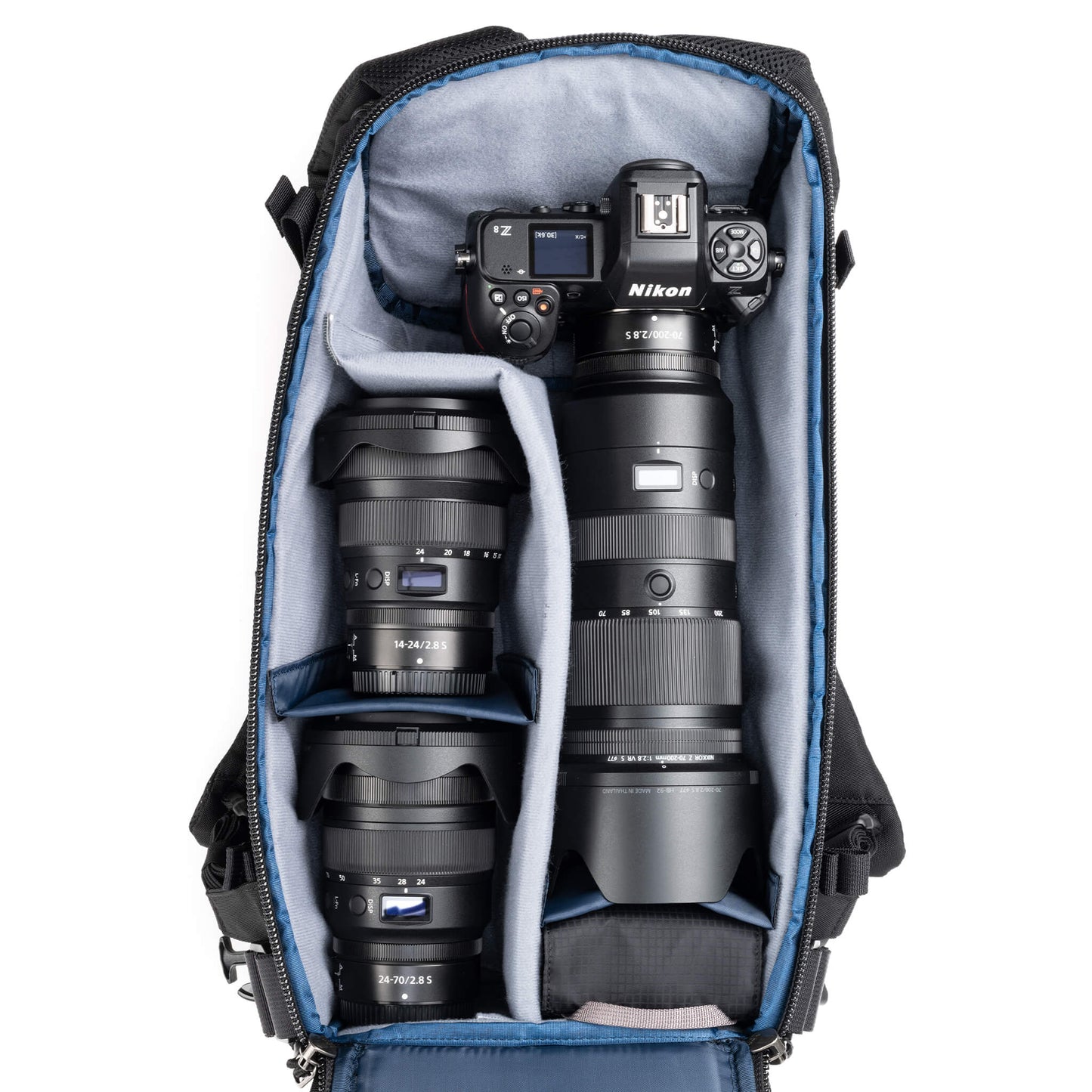 
                  
                    Holds a standard-sized camera body with lenses attached and 1–3
standard zoom lenses
                  
                