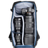 Holds a standard-sized camera body with lenses attached and 1–3
standard zoom lenses