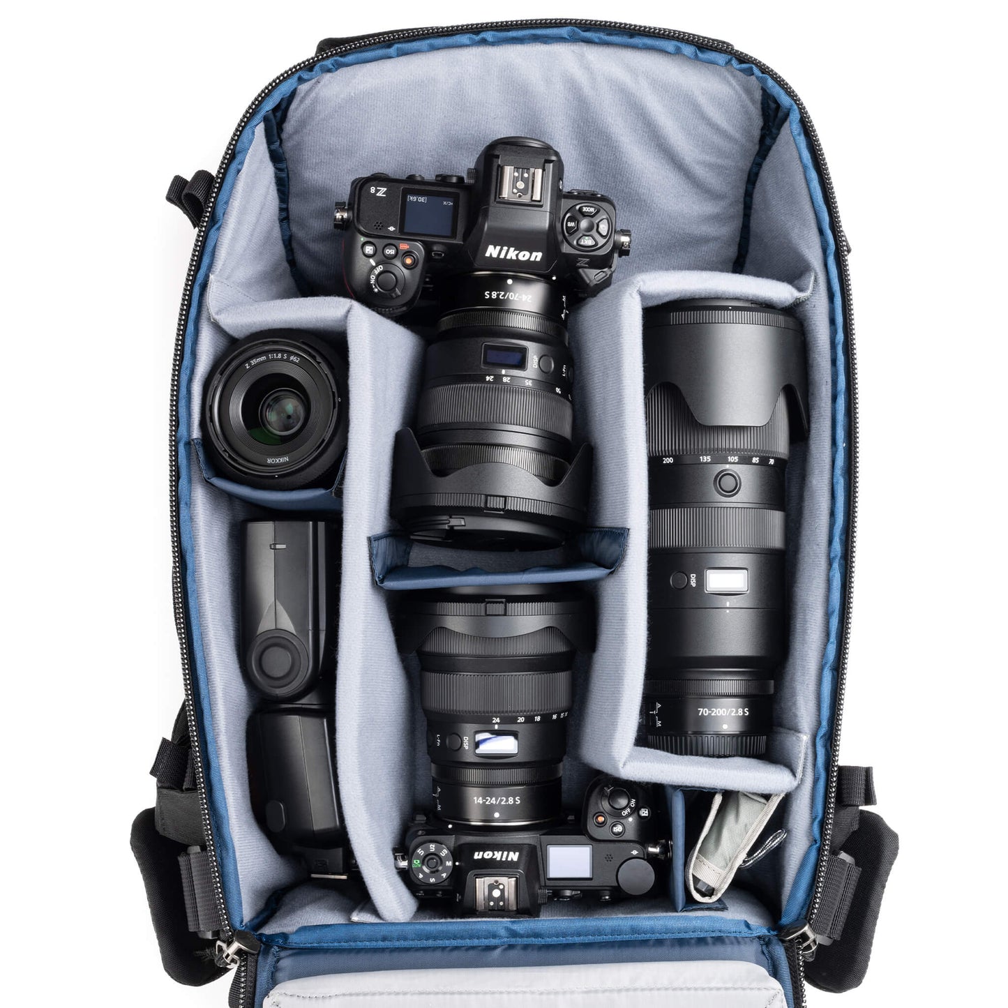 
                  
                    Holds two bodies with lenses attached and 2–3 lenses, or one body with lens attached plus 3–5 lenses
                  
                