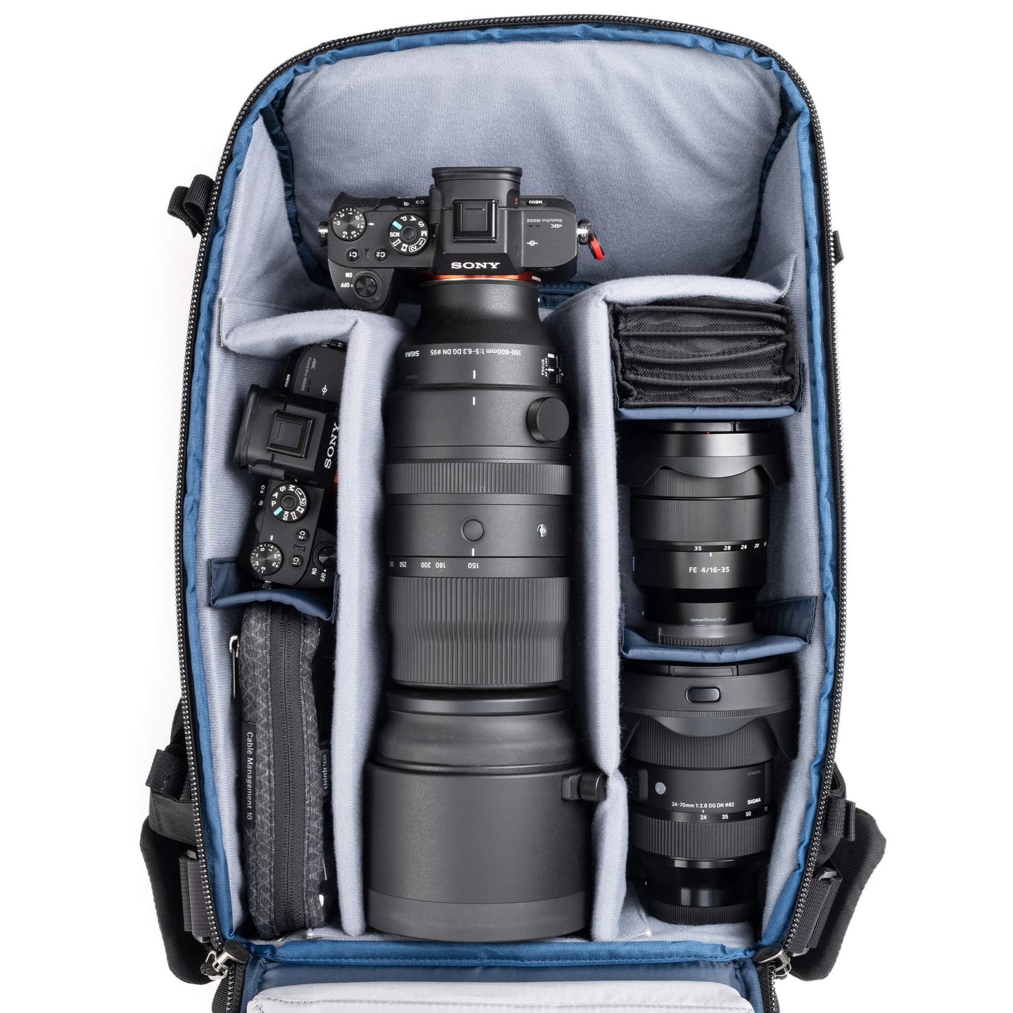 
                  
                    Holds two bodies with lenses attached and 2–3 lenses, or one body with lens attached plus 3–5 lenses
                  
                