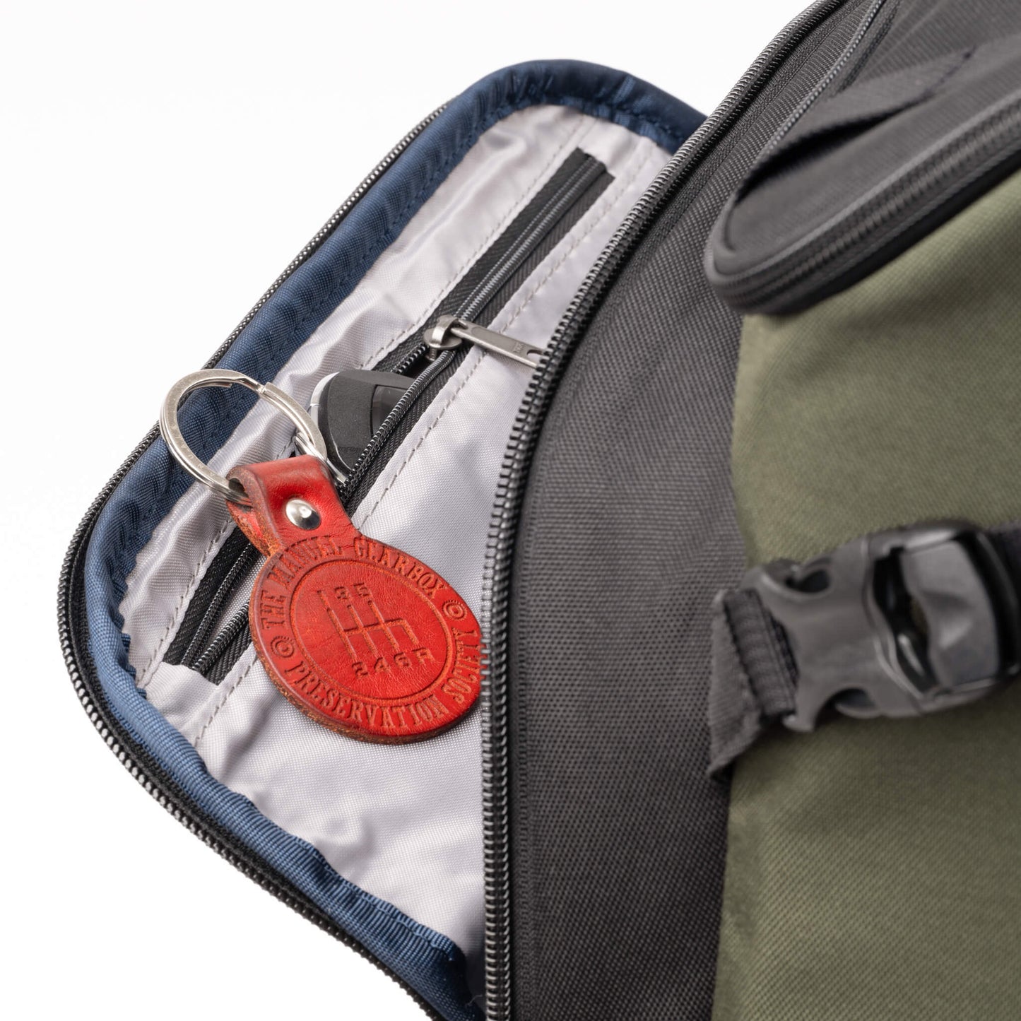 
                  
                    Zippered pocket inside front pocket for keys and other small items
                  
                