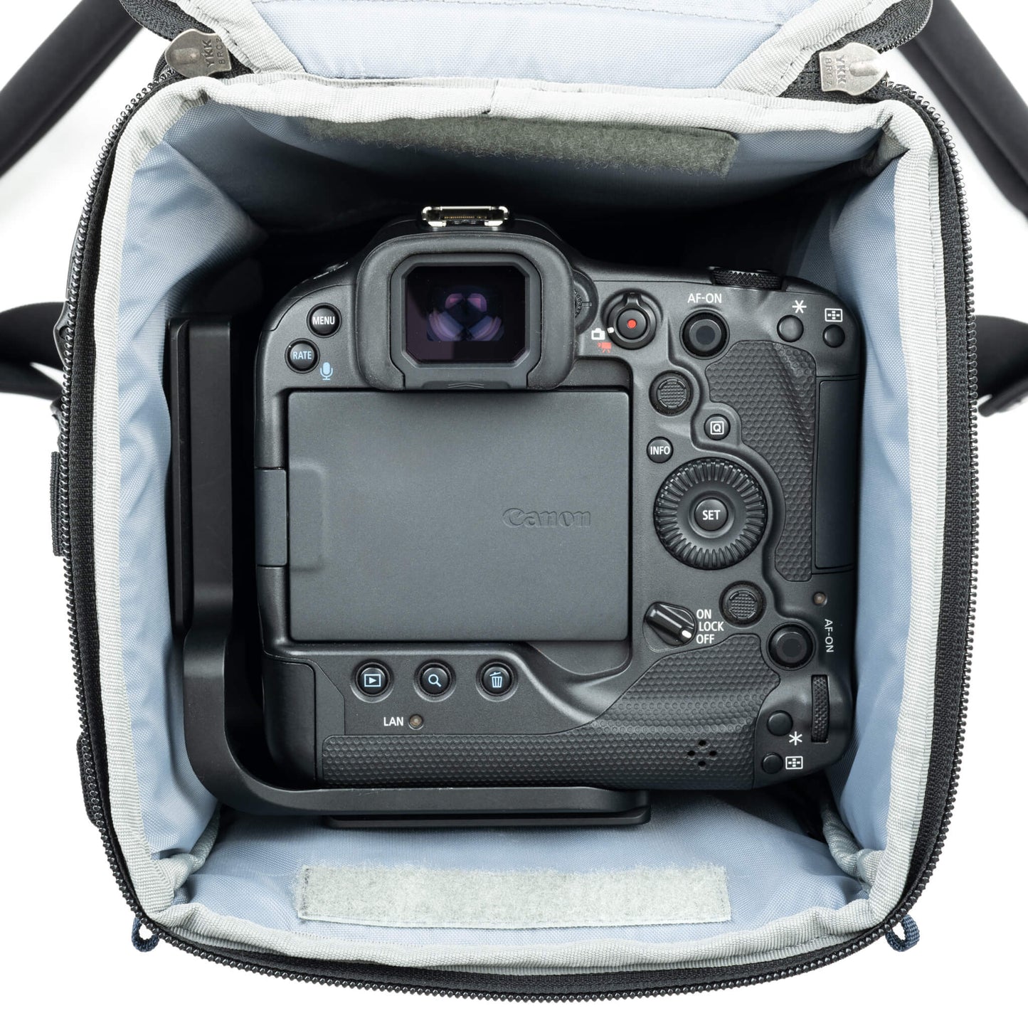 Designed to be form-fitting to a standard or gripped camera body with a zoom lens attached