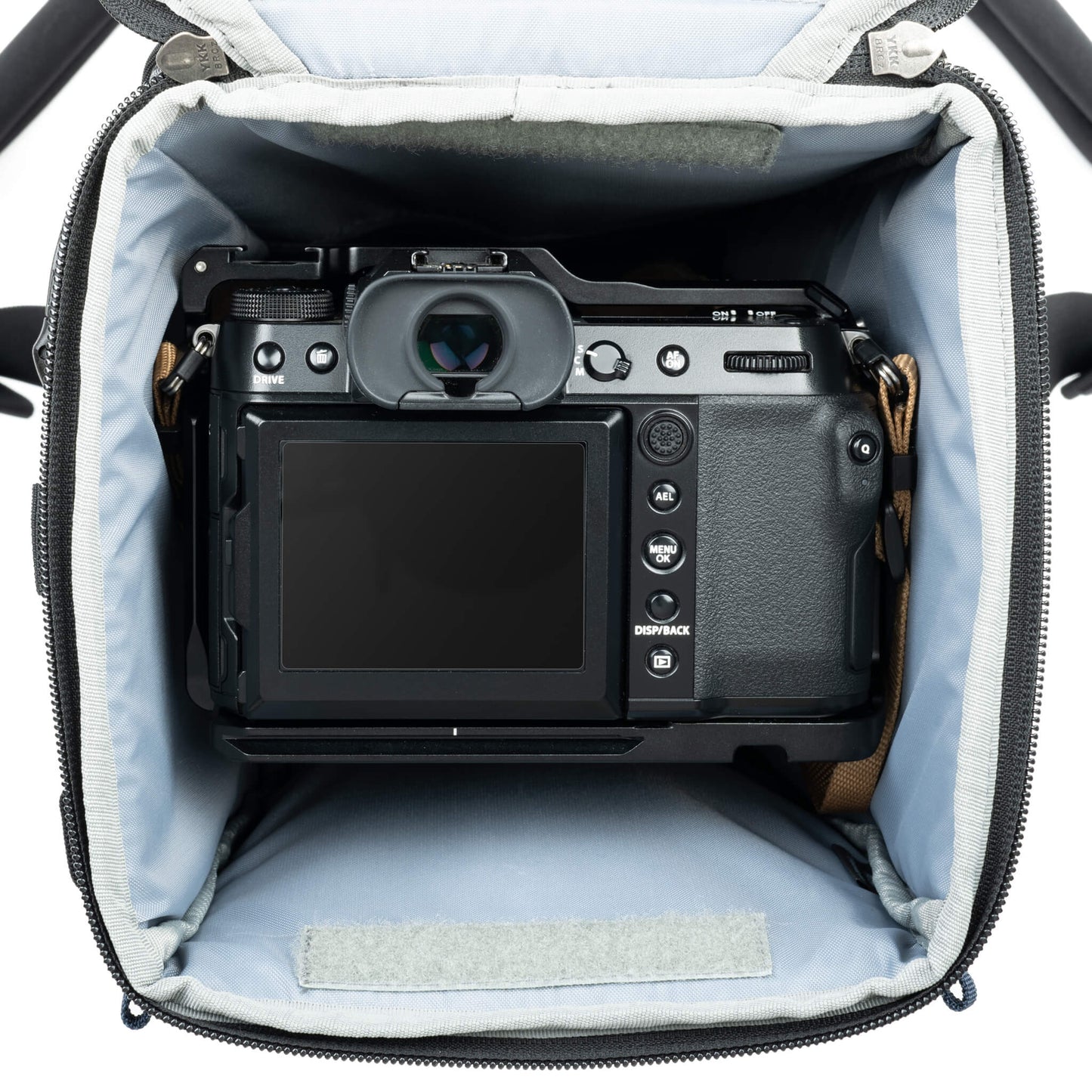 
                  
                    Fits a gripped or standard camera body with up to a 12” (30.5cm) lens attached.
                  
                