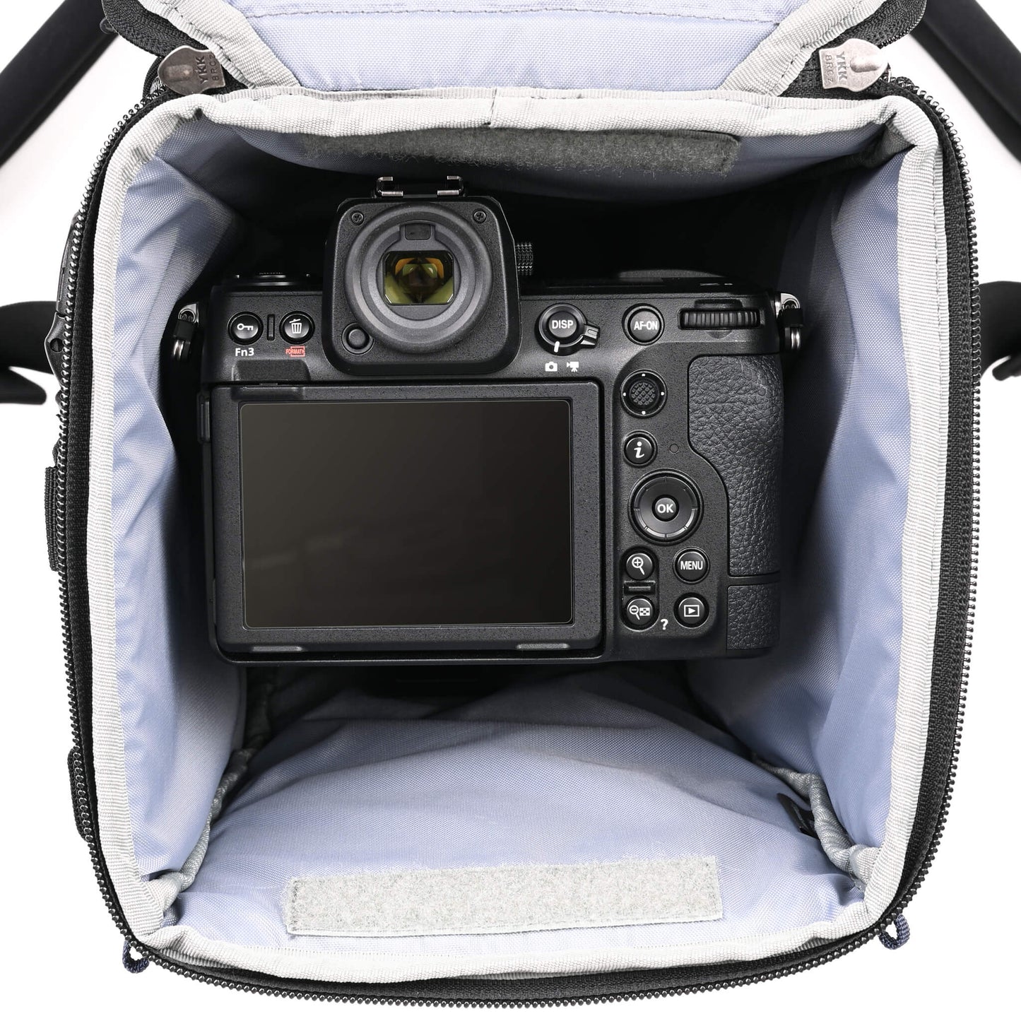 
                  
                    Fits a gripped or standard camera body with up to a 12” (30.5cm) lens attached.
                  
                