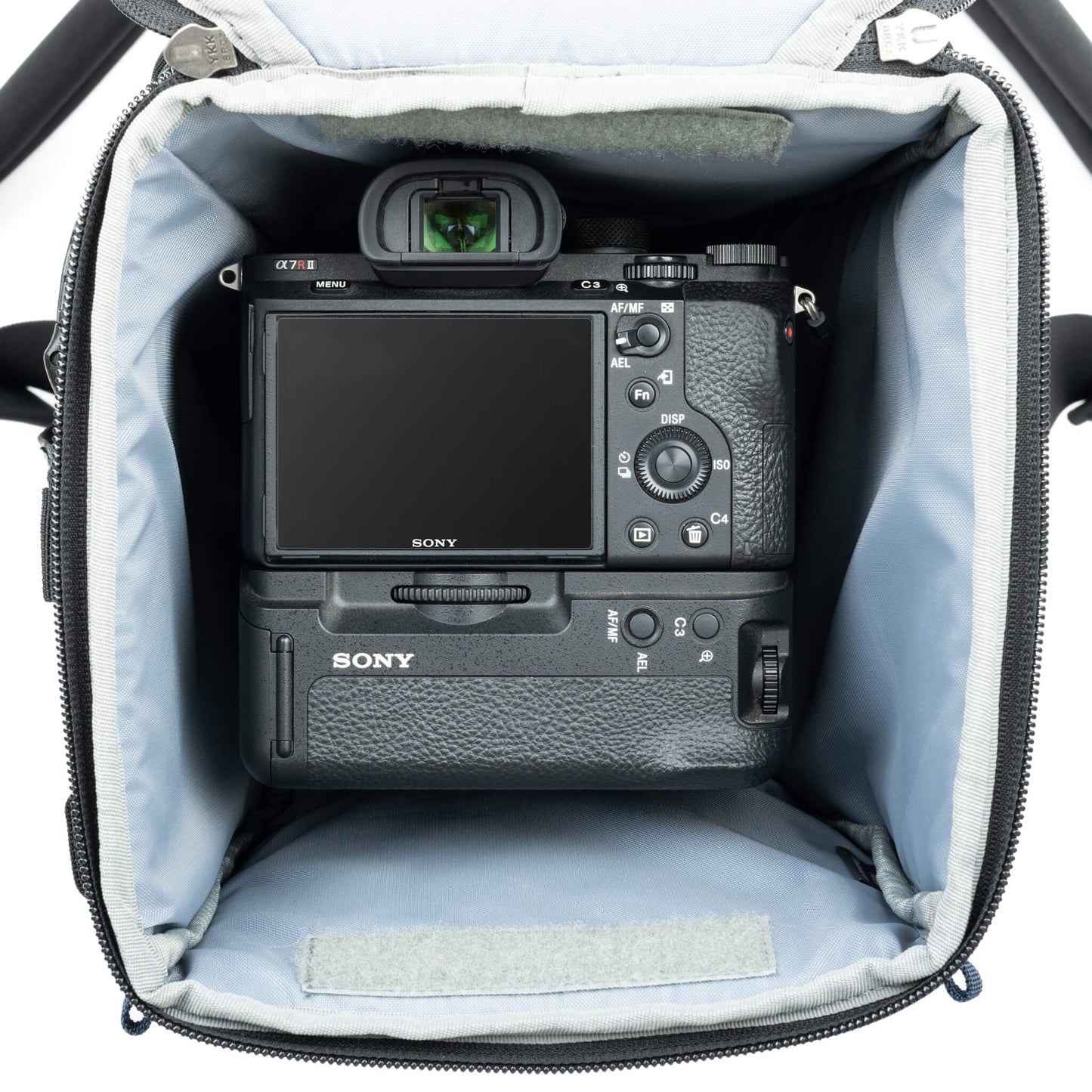 
                  
                    Fits a gripped or standard camera body with up to a 12” (30.5cm) lens attached.
                  
                