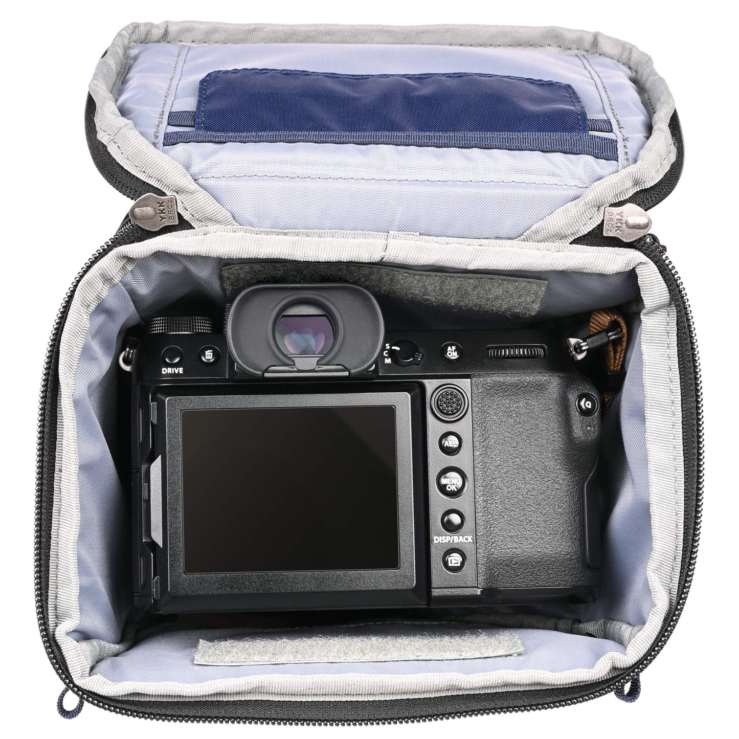 
                  
                    Fits a standard-size mirrorless camera body with a 24-70mm f/2.8 attached with the hood reversed. Popped-down, it fits a 70-200mm f/2.8 with its hood reversed.
                  
                