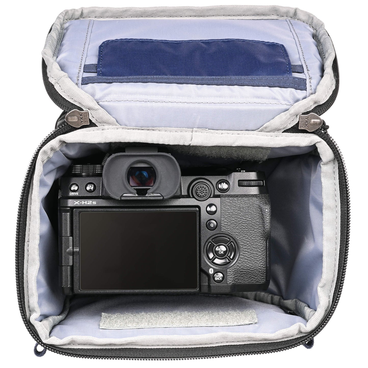 
                  
                    Fits a standard-size mirrorless camera body with a 24-70mm f/2.8 attached with the hood reversed. Popped-down, it fits a 70-200mm f/2.8 with its hood reversed.
                  
                