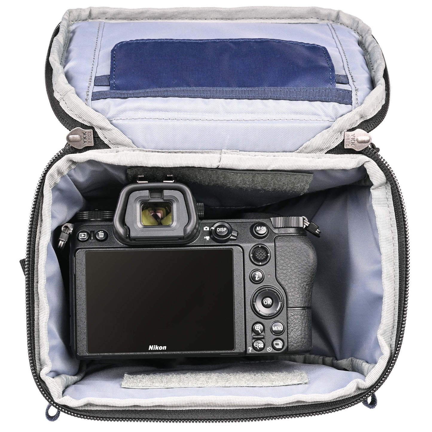 
                  
                    Fits a standard-size mirrorless camera body with a 24-70mm f/2.8 attached with the hood reversed. Popped-down, it fits a 70-200mm f/2.8 with its hood reversed.
                  
                