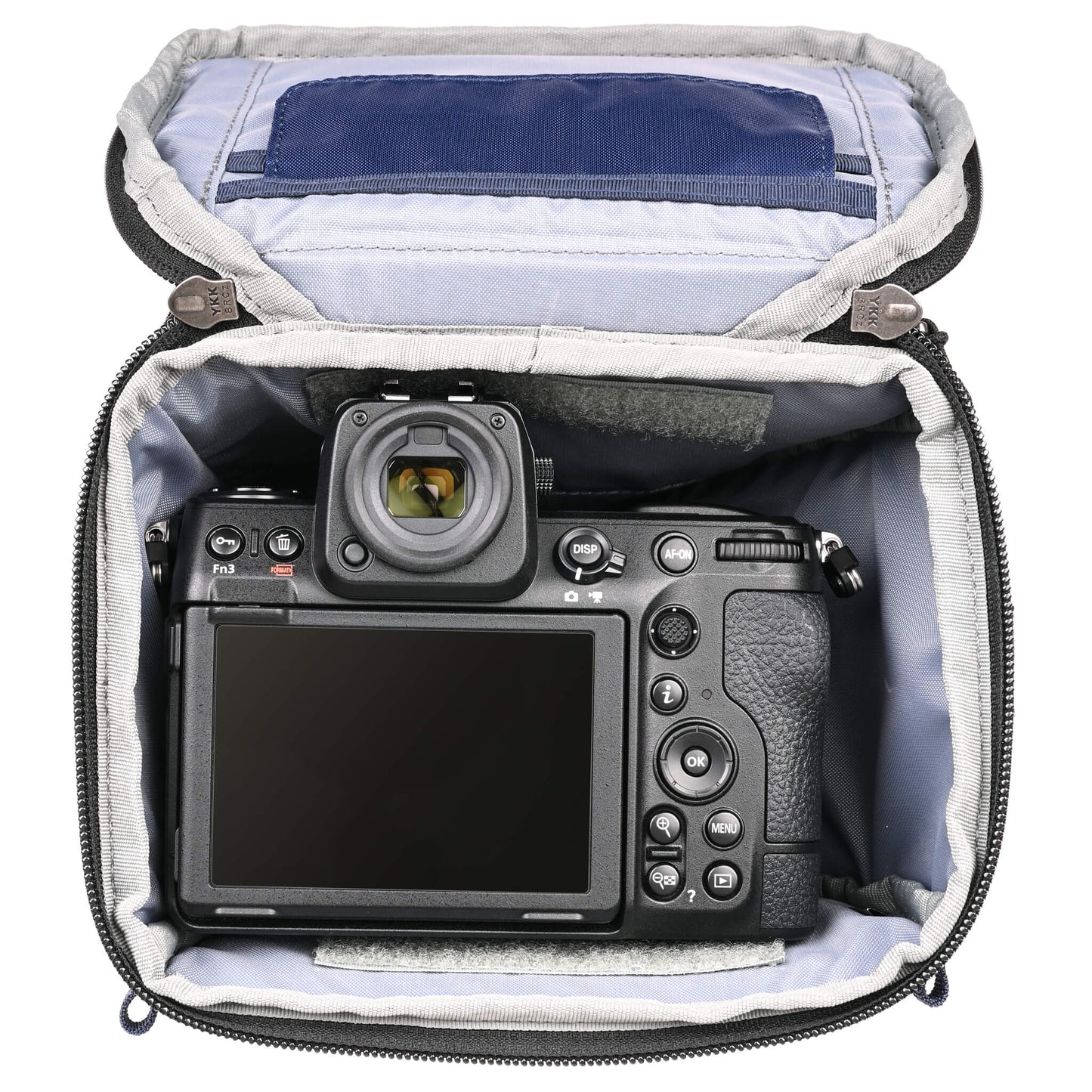 
                  
                    Fits a standard-size mirrorless camera body with a 24-70mm f/2.8 attached with the hood reversed. Popped-down, it fits a 70-200mm f/2.8 with its hood reversed.
                  
                