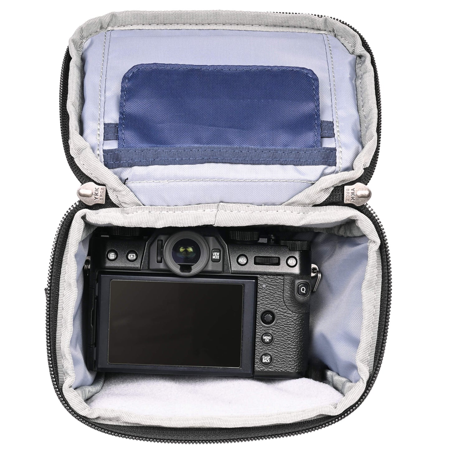 
                  
                    Fits compact mirrorless body, such as a Canon R50 or R10, Nikon Z5, Fuji X-T30, or Sony A6000 series body with a short lens attached.
                  
                