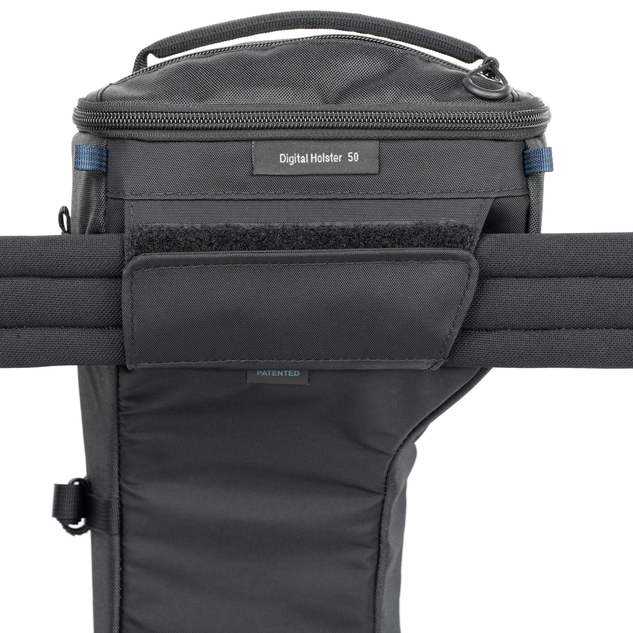 Attachment on back for connection to any Think Tank belt or belt pack, and select backpack waist belts