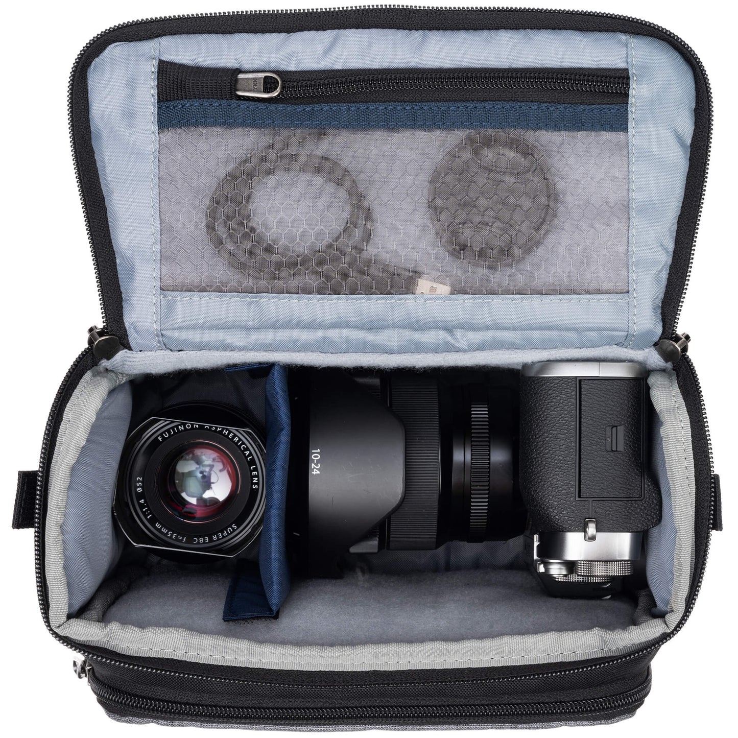 
                  
                    Fits one standard mirrorless body plus 1 to 2 lenses: short to medium f/4 zooms or short to medium primes.
                  
                