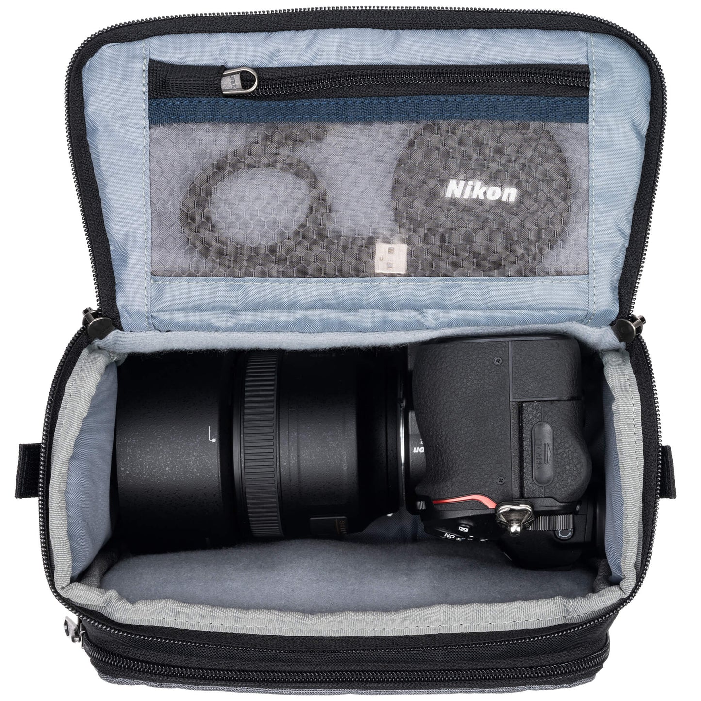 
                  
                    Fits one standard mirrorless body plus 1 to 2 lenses: short to medium f/4 zooms or short to medium primes.
                  
                