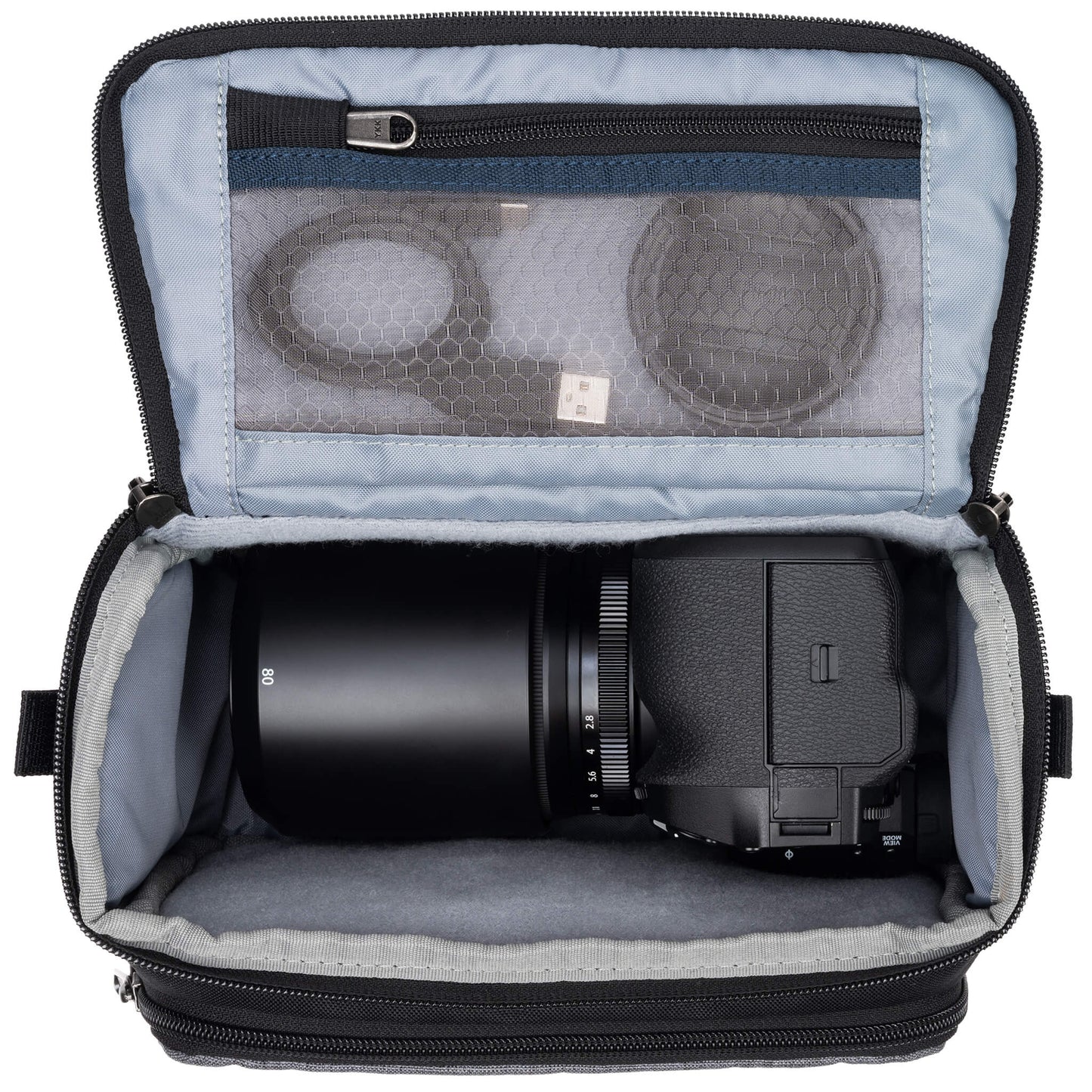 
                  
                    Fits one standard mirrorless body plus 1 to 2 lenses: short to medium f/4 zooms or short to medium primes.
                  
                