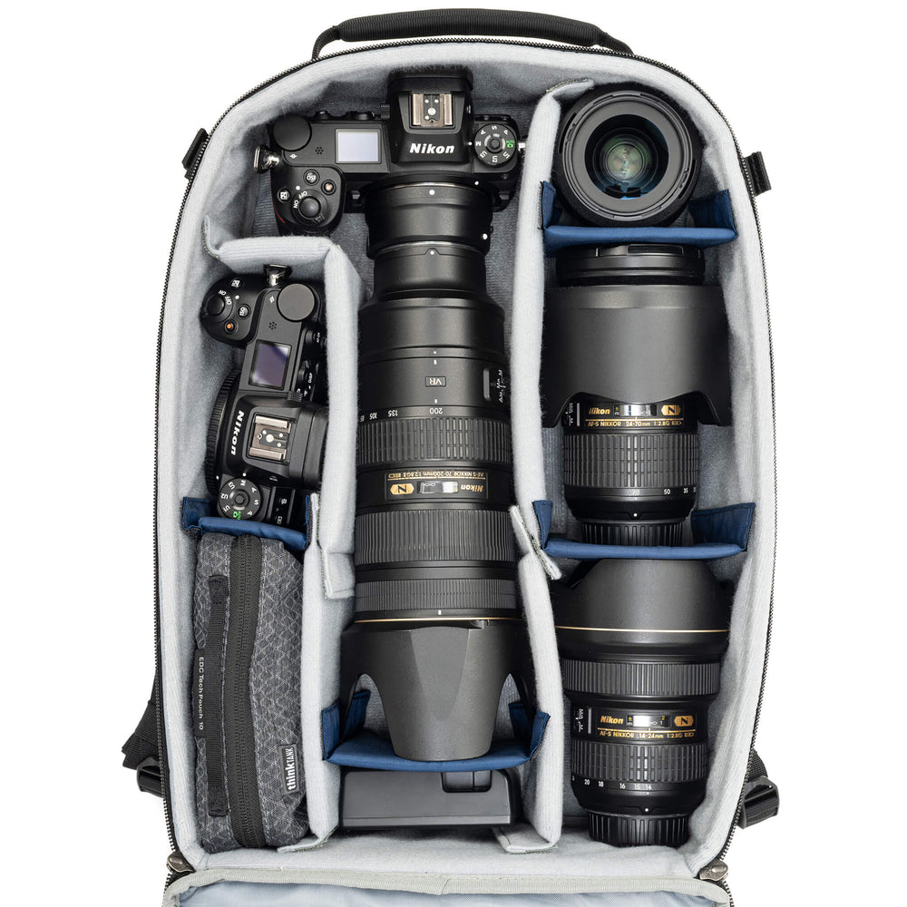 
                  
                    Fits 2 Standard Mirrorless Bodies and zoom trifecta with 70-200mm f/2.8 attached with hood extended
                  
                