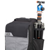 Expandable side pockets and locking compression straps for water bottles  and/or travel tripod