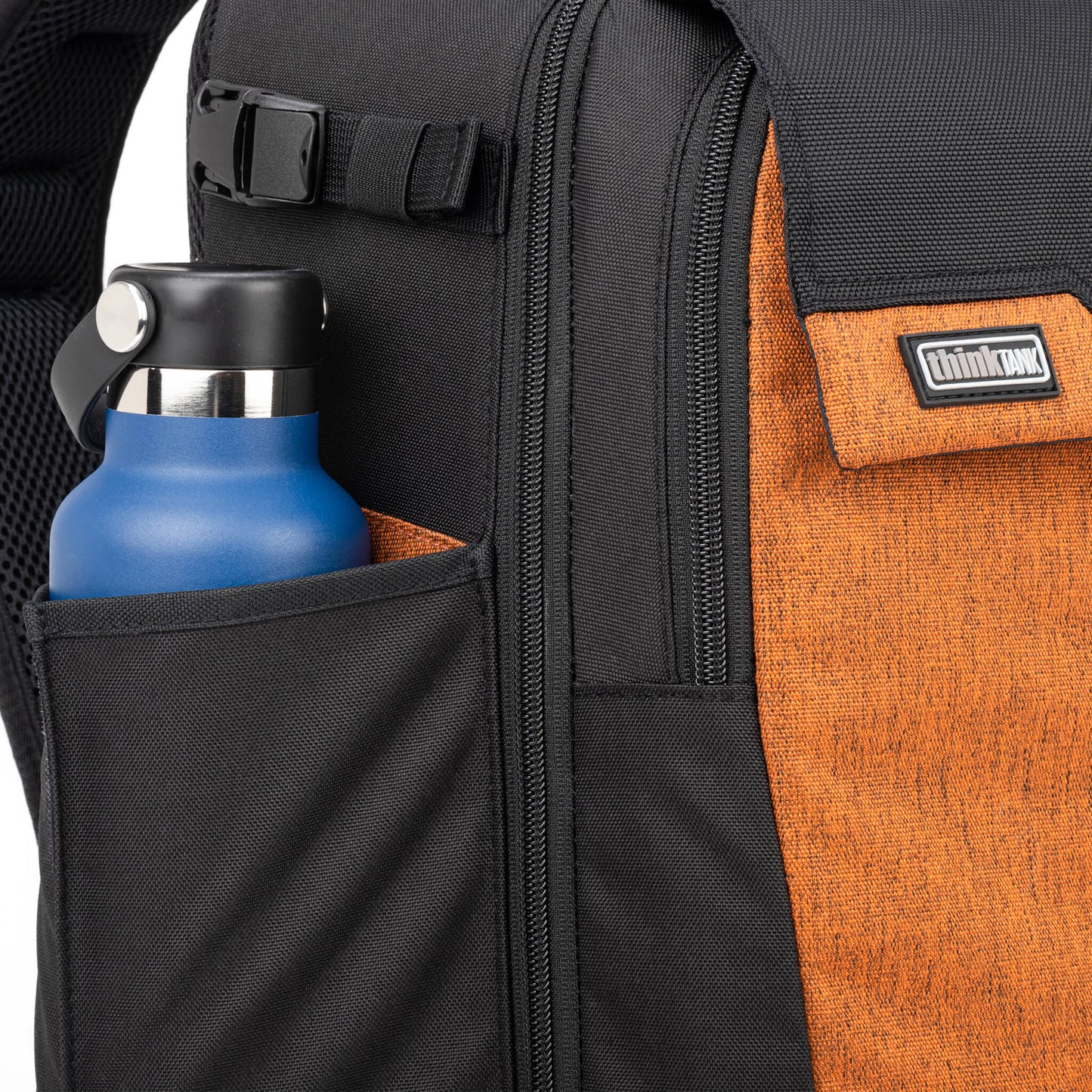 
                  
                    Expandable side pockets and locking compression straps for water bottles  and/or travel tripod
                  
                