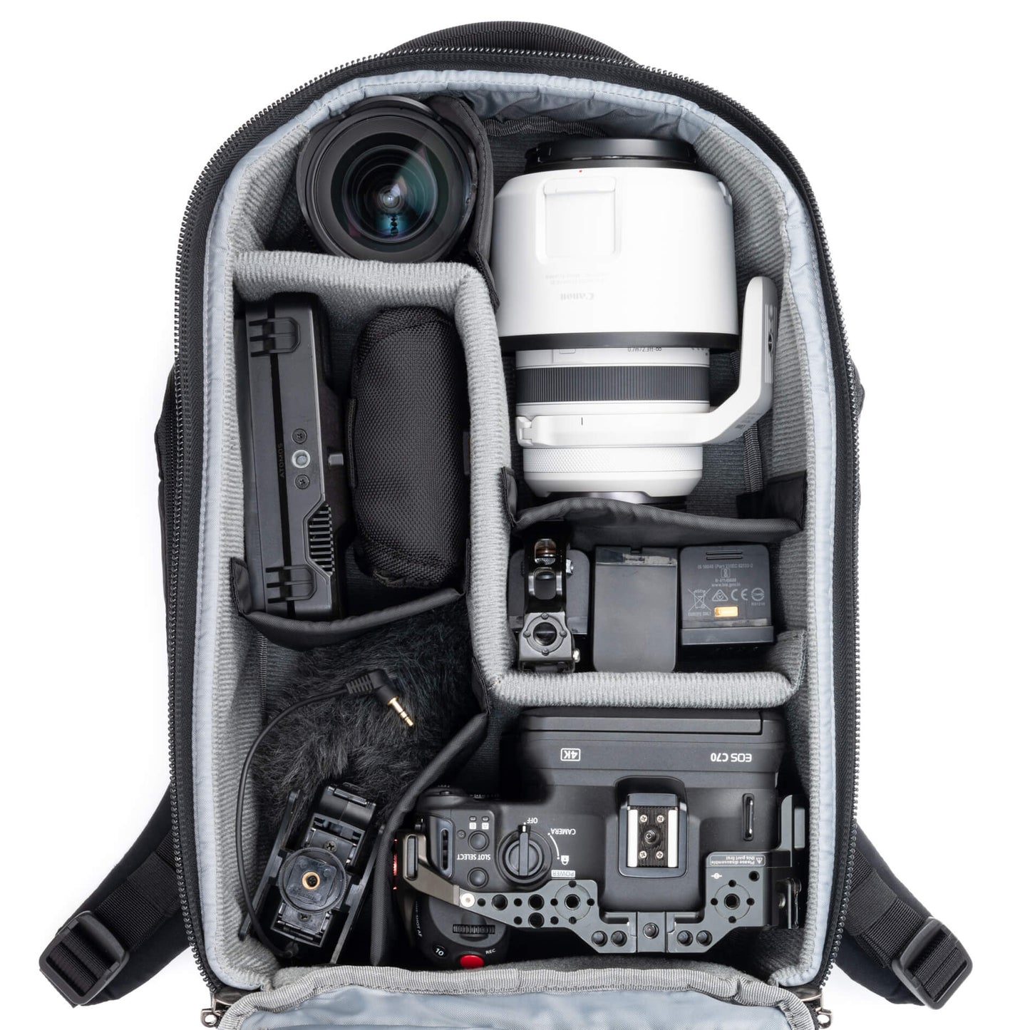 
                  
                    Fits two gripped camera bodies with lenses attached and an additional 4-6 standard zoom lenses
                  
                