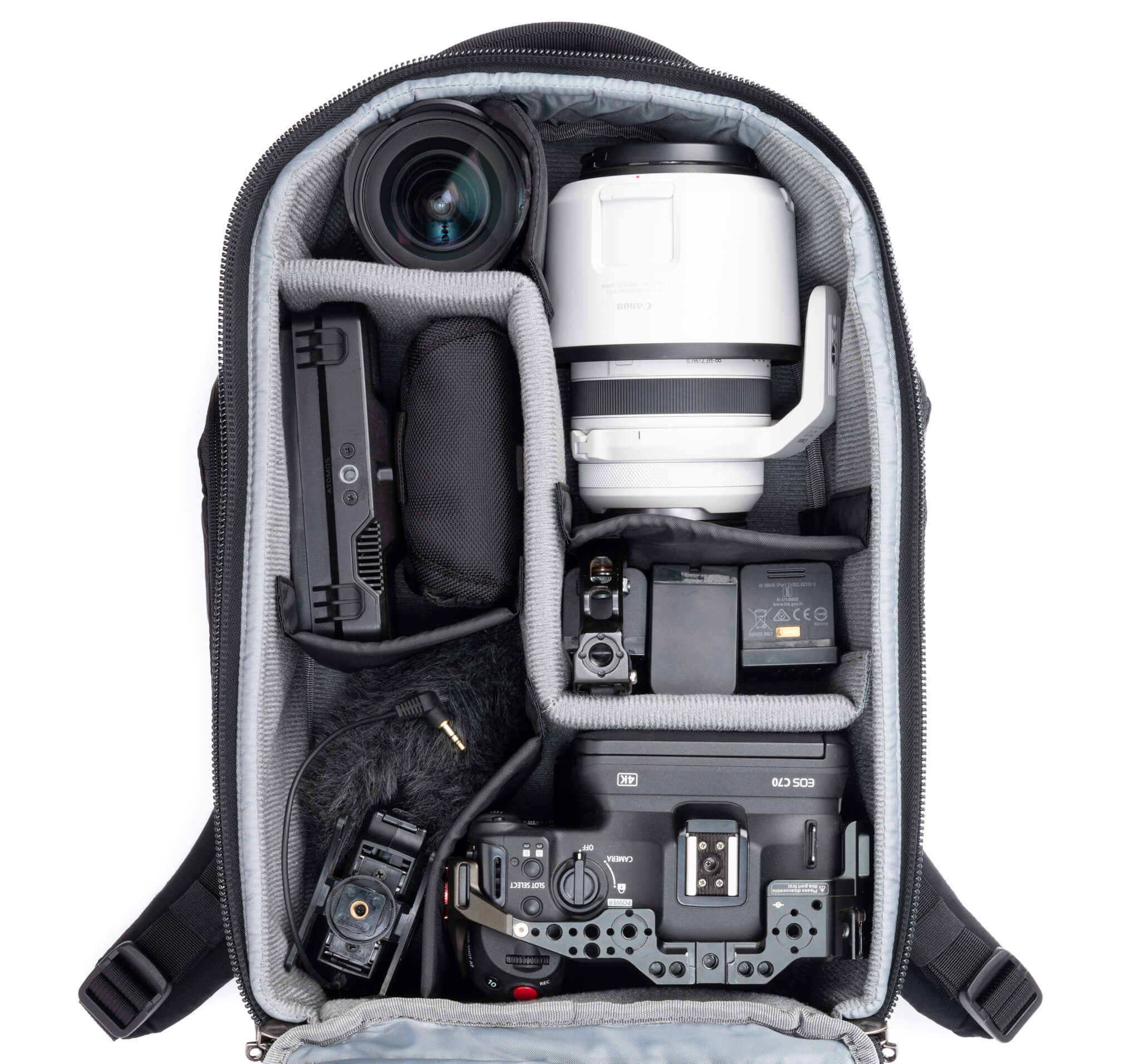 Fits two gripped camera bodies with lenses attached and an additional 4-6 standard zoom lenses