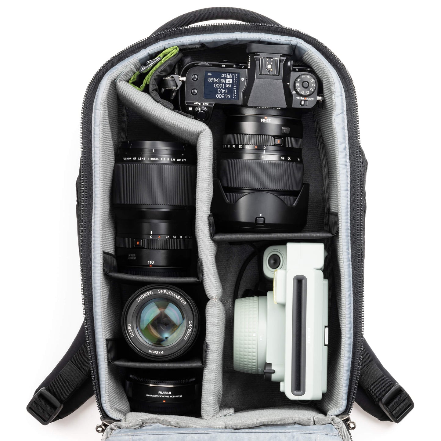 
                  
                    Fits two gripped camera bodies with lenses attached and an additional
4-6 standard zoom lenses
                  
                