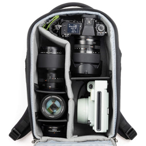 Fits two gripped camera bodies with lenses attached and an additional
4-6 standard zoom lenses