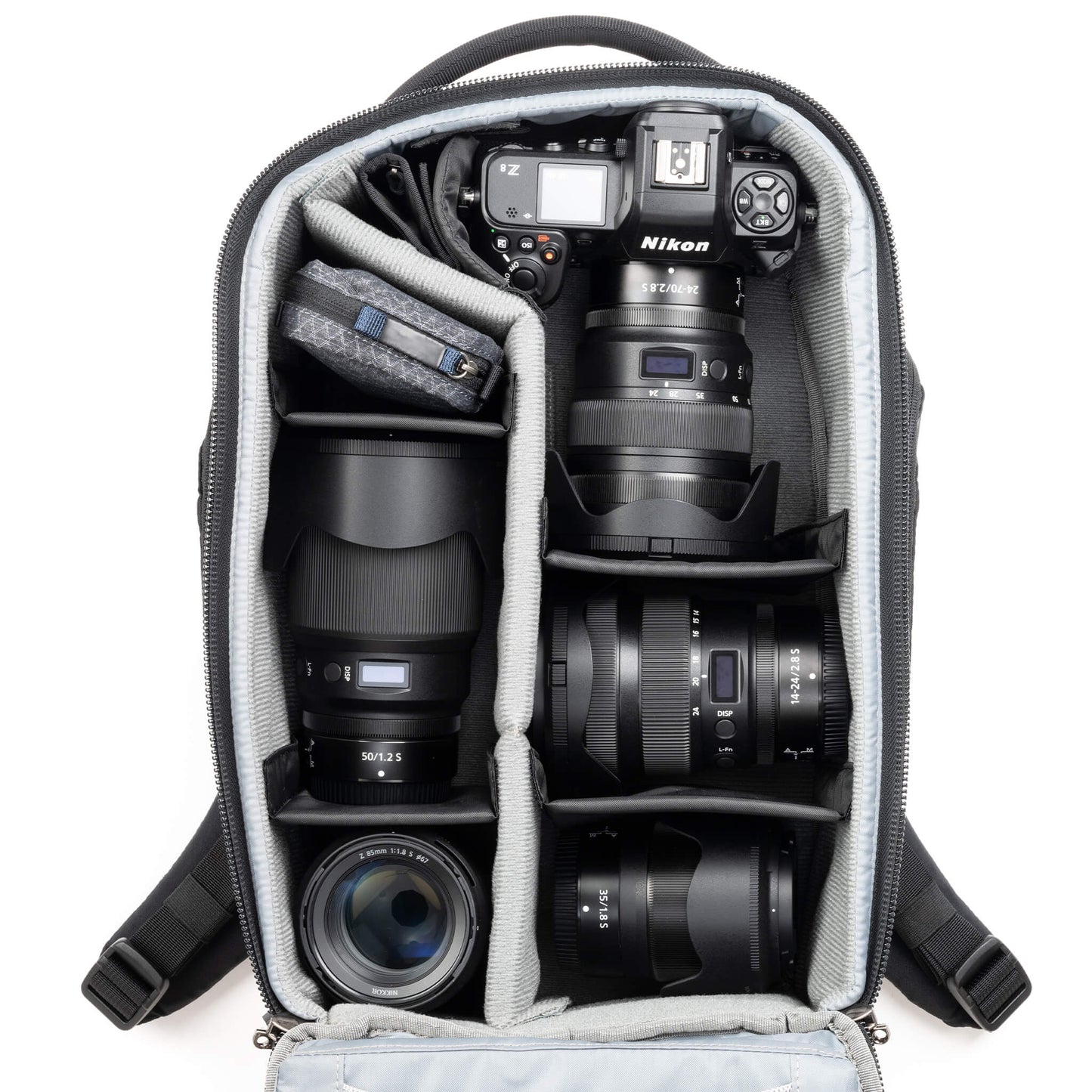 
                  
                    Fits two gripped camera bodies with lenses attached and an additional
4-6 standard zoom lenses
                  
                