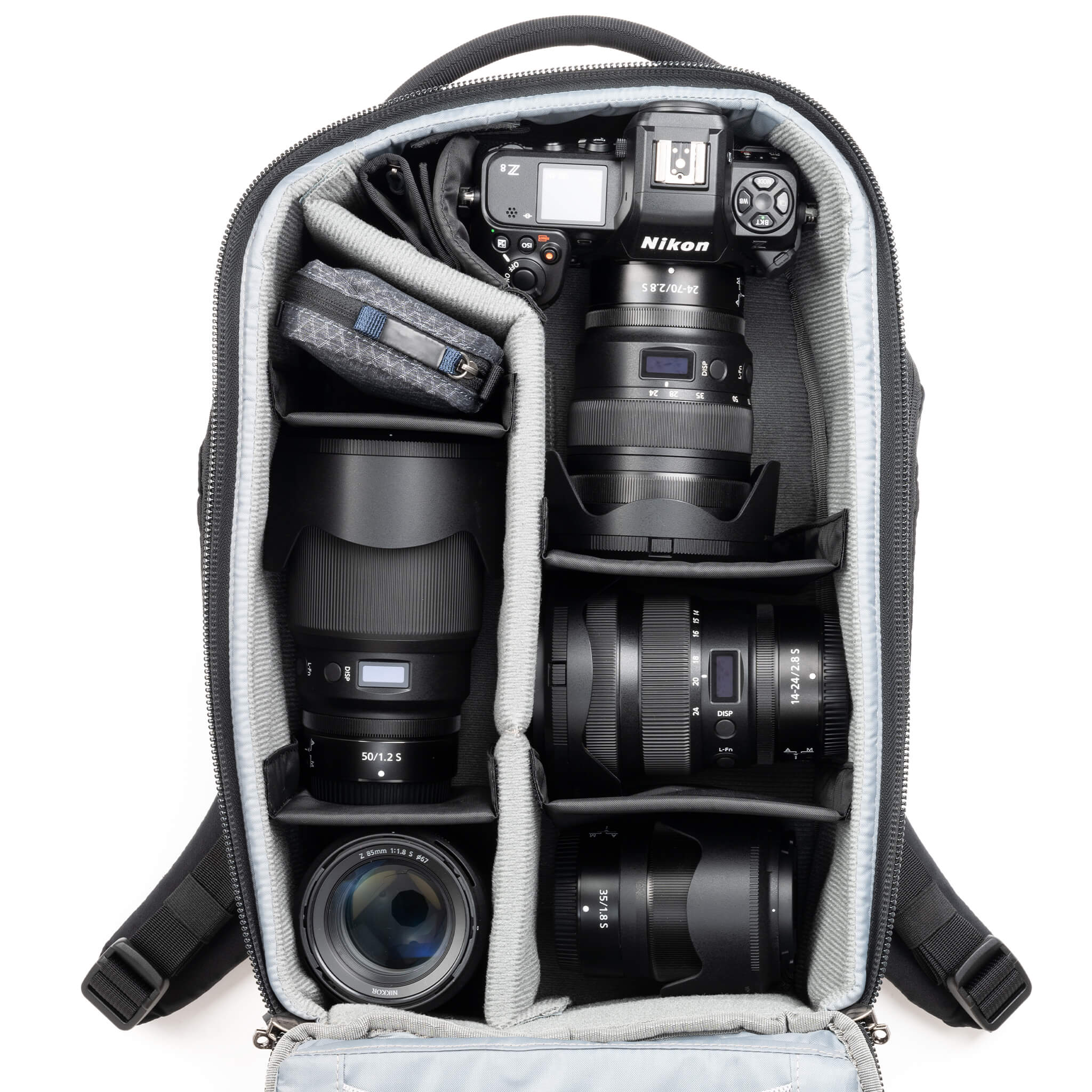 Fits two gripped camera bodies with lenses attached and an additional
4-6 standard zoom lenses