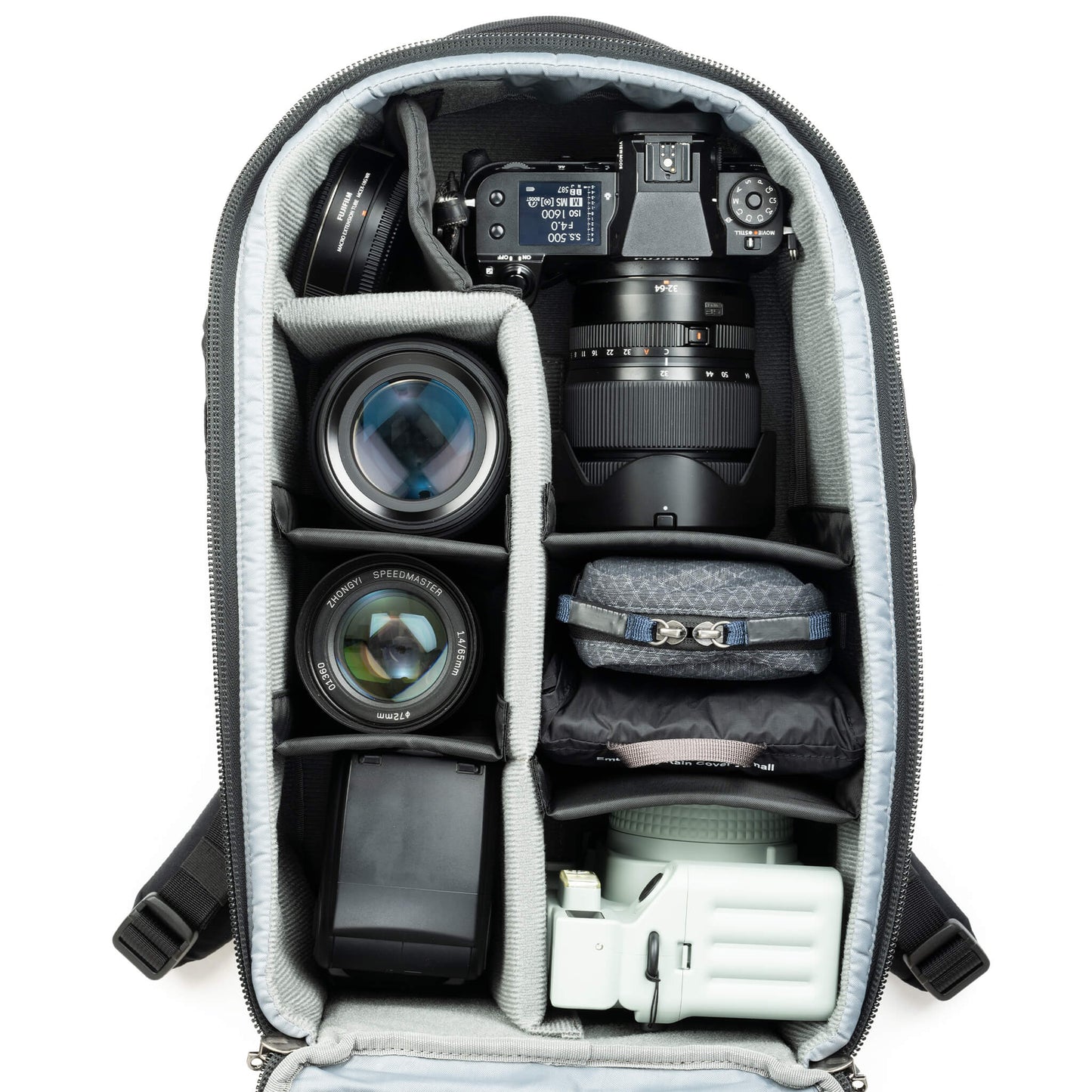 
                  
                    Fits two gripped camera bodies with lenses attached and an additional 3-5 standard zoom lenses or a 400mm f/2.8
                  
                