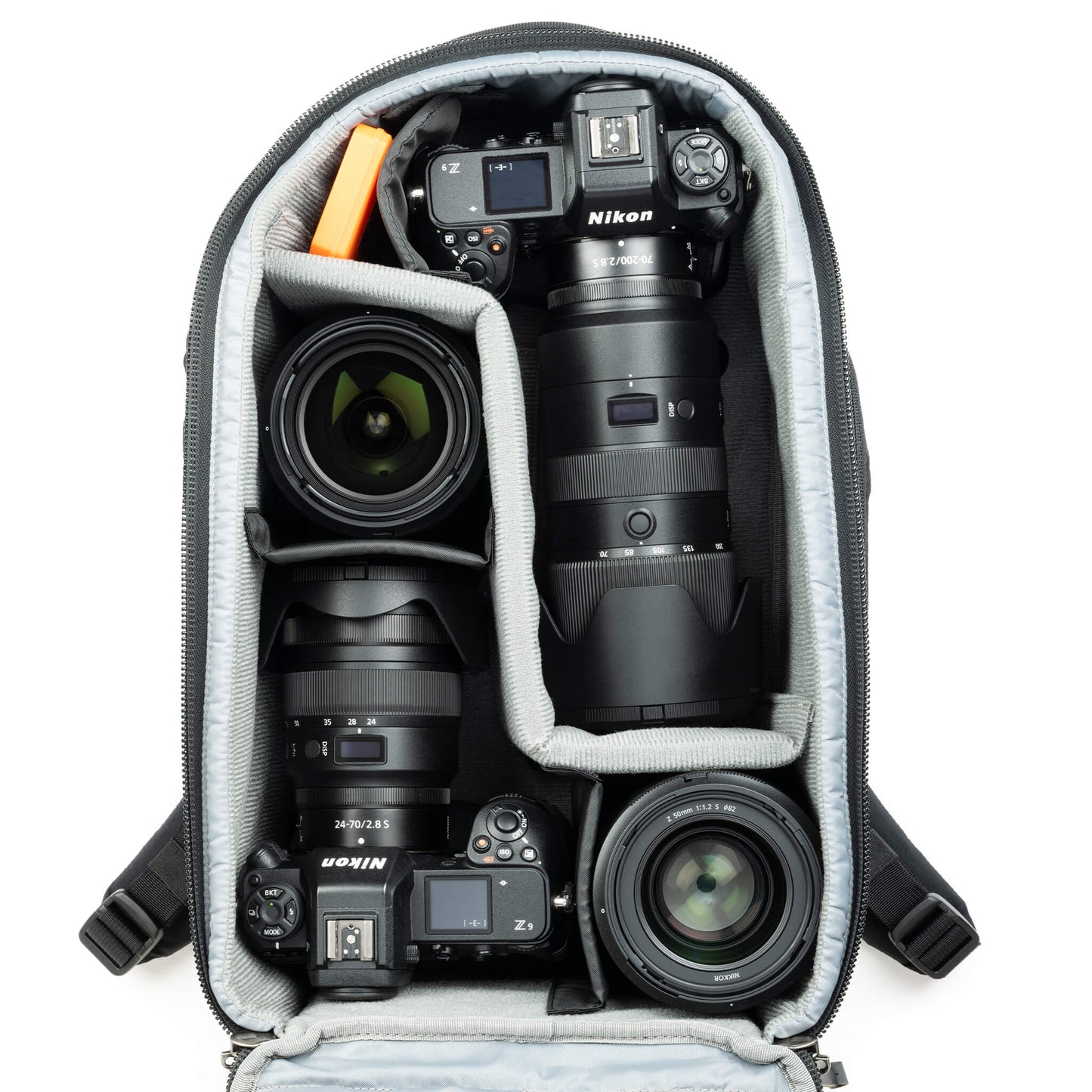 
                  
                    Fits two gripped camera bodies with lenses attached and an additional 3-5 standard zoom lenses or a 400mm f/2.8
                  
                