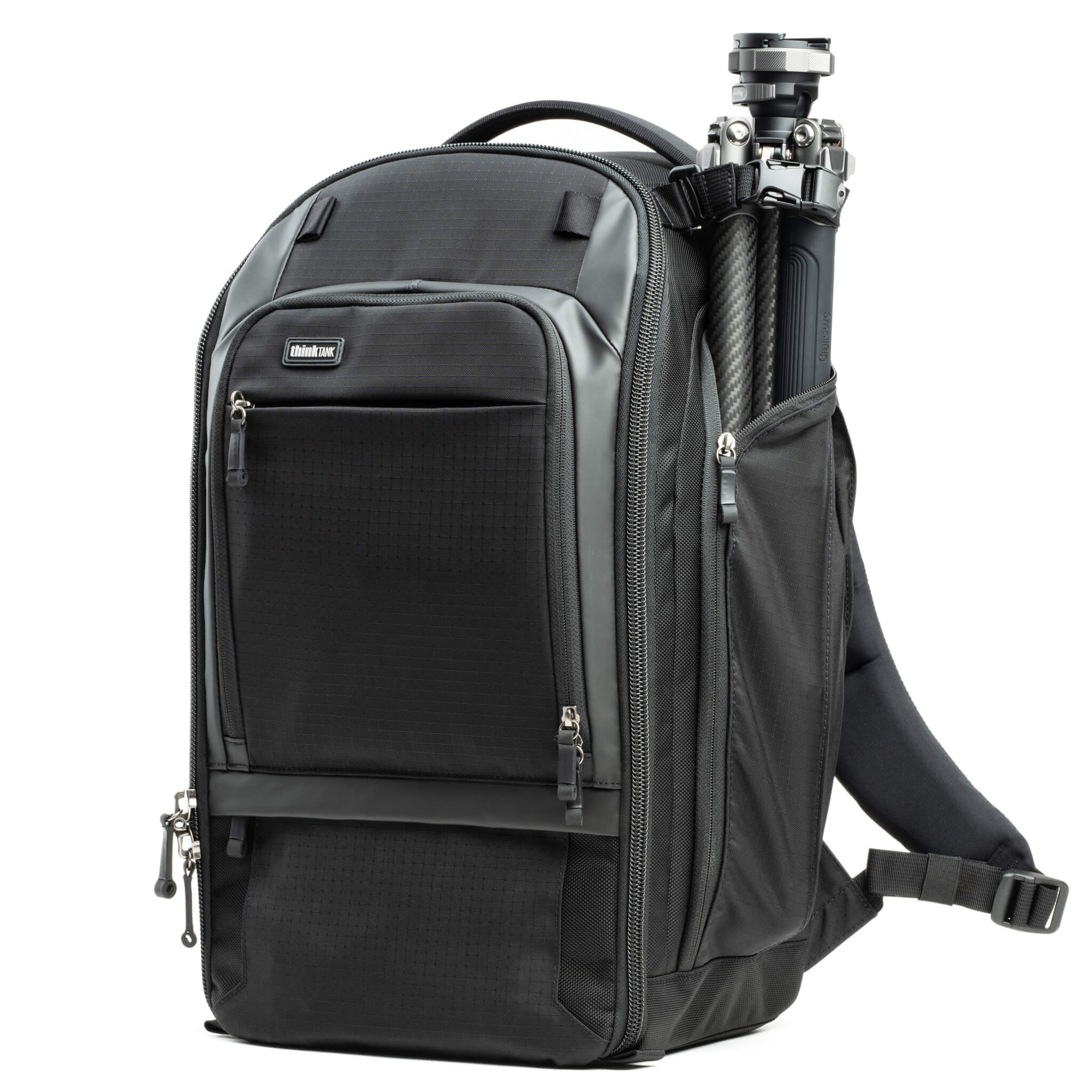 Three tripod carry options: one on each side using water bottle pockets and one on front for larger tripods using a drop cup