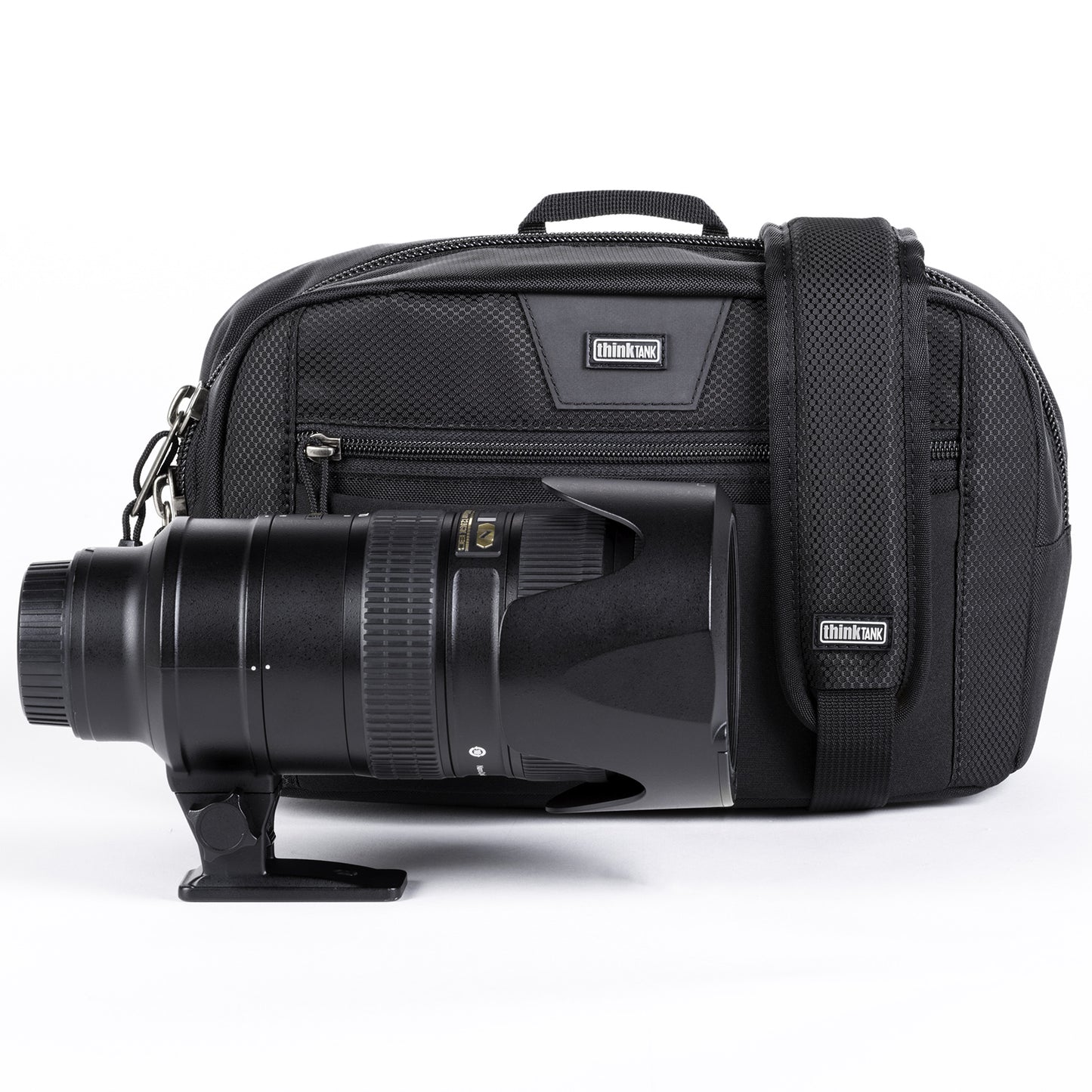 
                  
                    Accomodates 70–200mm f/2.8 lying horizontally, shoulder strap included
                  
                