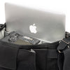 Dedicated pockets fit a 10" tablet and 12" laptop